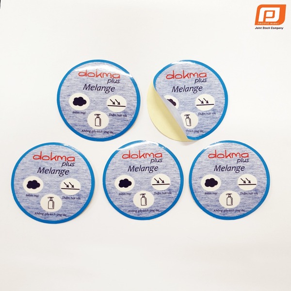 Tem dán Dokma tròn - Nhãn Mác Và Phụ Liệu Dệt May Thanh Bình - Công Ty Cổ Phần Sản Xuất Nhãn Mác Và Phụ Liệu Dệt May Thanh Bình