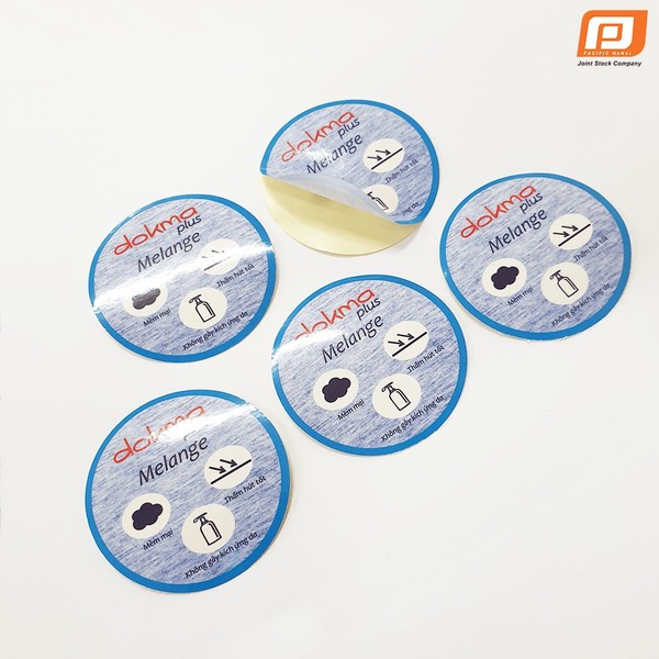 Tem dán Dokma tròn - Nhãn Mác Và Phụ Liệu Dệt May Thanh Bình - Công Ty Cổ Phần Sản Xuất Nhãn Mác Và Phụ Liệu Dệt May Thanh Bình