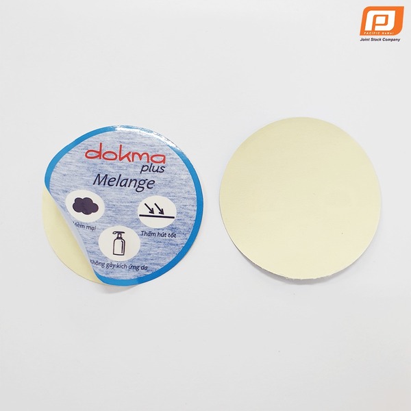 Tem dán Dokma tròn - Nhãn Mác Và Phụ Liệu Dệt May Thanh Bình - Công Ty Cổ Phần Sản Xuất Nhãn Mác Và Phụ Liệu Dệt May Thanh Bình