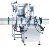 Máy xiết nắp chai