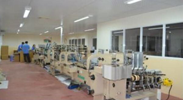 Máy dán keo tự động - In Số 7 - Công Ty Cổ Phần In Số 7