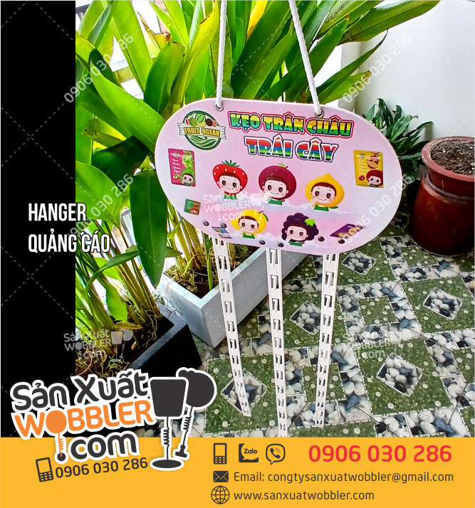 Mẫu Hanger gắn 3 dây nhựa quảng cáo Kẹo - In ấn Quảng Cáo Quang Hưng - Công Ty TNHH Một Thành Viên In ấn Quang Hưng