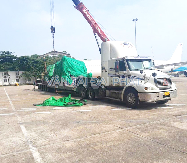 Vân chuyển máy móc công trình bằng xe cẩu lun