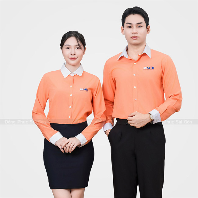 Đồng phục sơ mi công sở màu cam phối trắng - May Đồng Phục Nhật Thịnh - Công Ty TNHH Sản Xuất - Thương Mại Nhật Thịnh