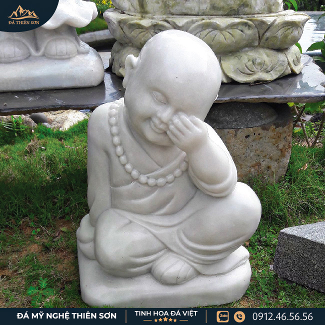 Tượng chú tiểu bằng đá