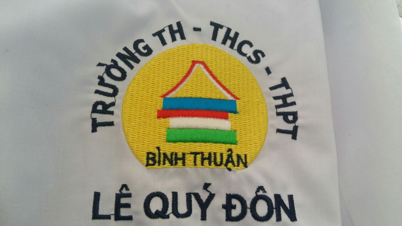 In thêu Logo - May Mặc Việt Nữ - Công Ty TNHH May Mặc Việt Nữ