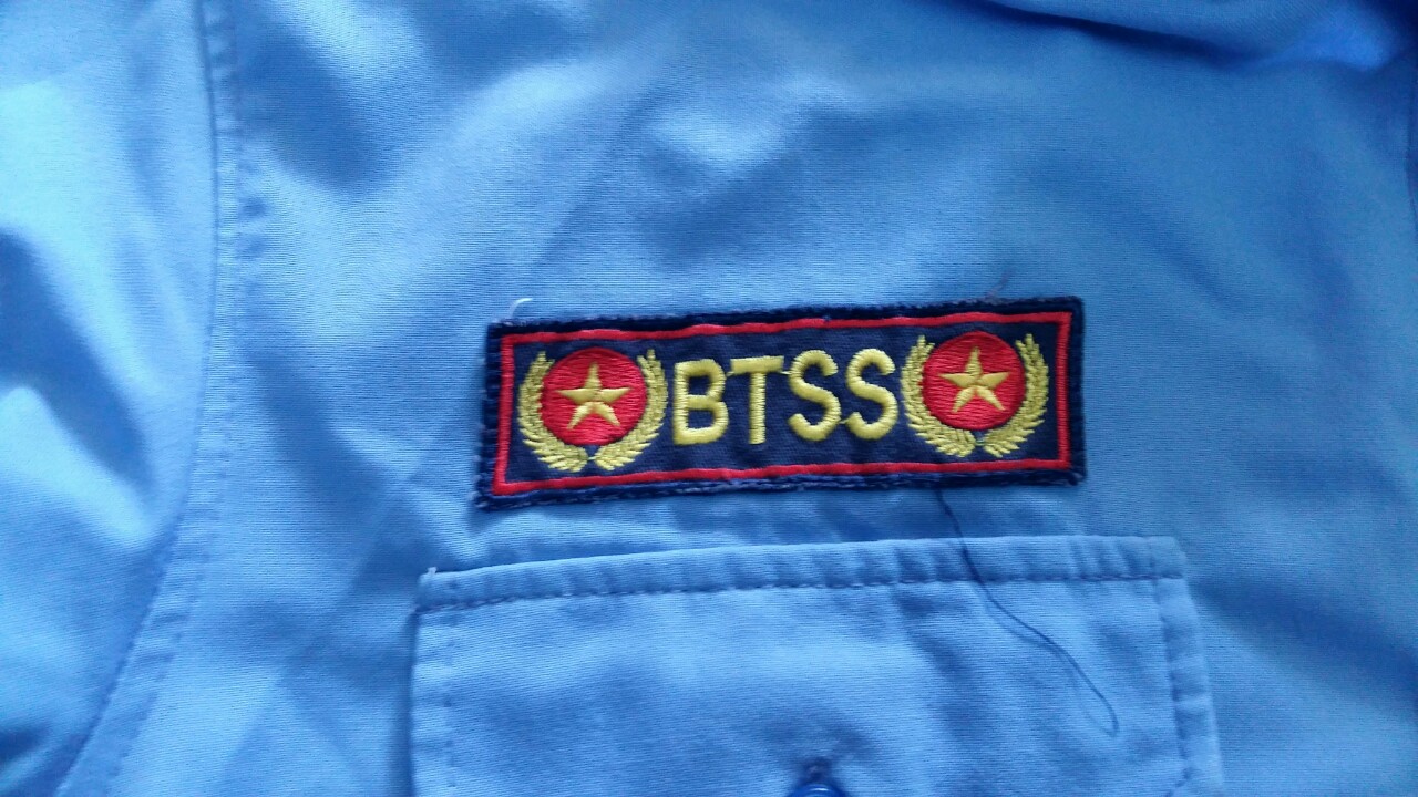 In thêu Logo - May Mặc Việt Nữ - Công Ty TNHH May Mặc Việt Nữ