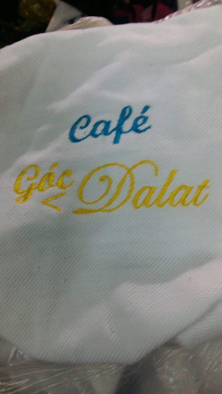 In thêu Logo - May Mặc Việt Nữ - Công Ty TNHH May Mặc Việt Nữ