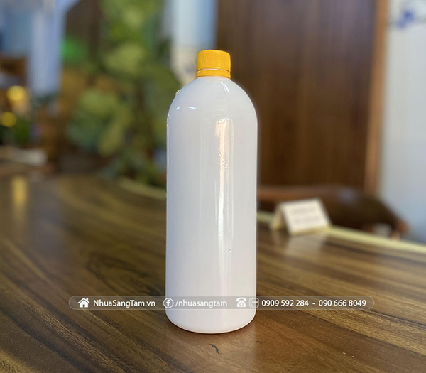 Chai 1L ST sữa - Chai PET Sáng Tâm - Công Ty TNHH Sản Xuất Bao Bì Nhựa Sáng Tâm