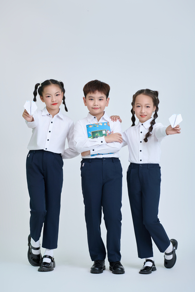 Áo somi dài tay cúc xanh than học sinh cấp 1 - May Đồng Phục Sao Mai - Công Ty TNHH Thương Mại Sao Mai