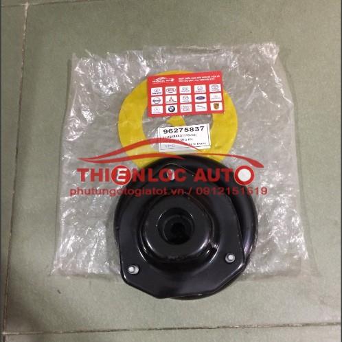 Bát bèo giảm sóc sau phải KIA Spectra