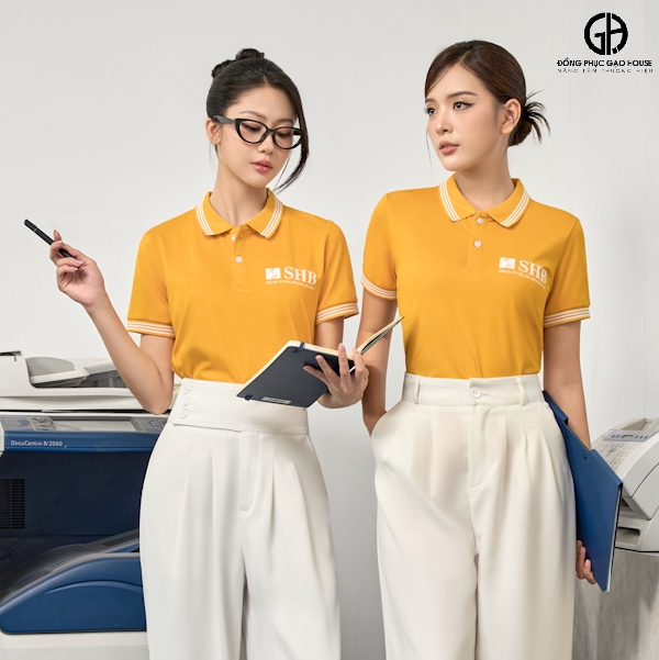 Áo đồng phục công ty màu vàng shb phối cổ đức