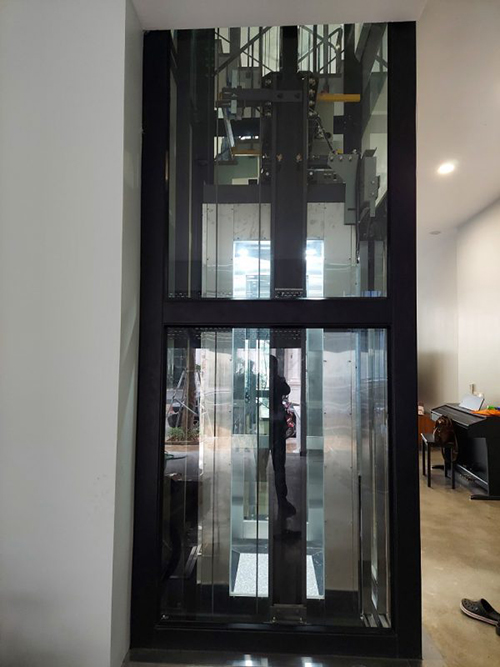 Thang máy Cabin kính xen kẽ inox