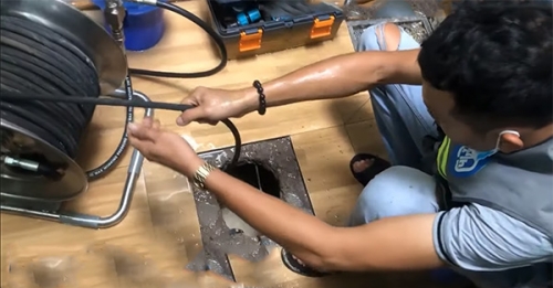 Thông ống thoát nước
