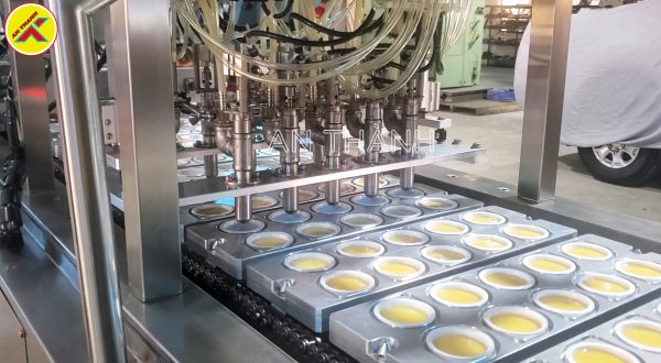 Máy dán miệng ly (bánh Flan)