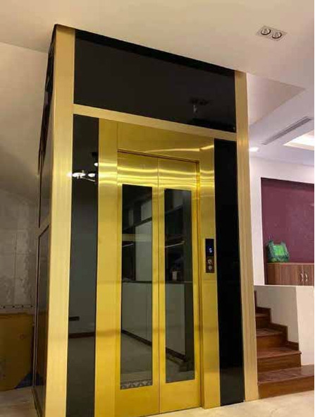 Khung hố thang máy kết cấu bằng thép và kính