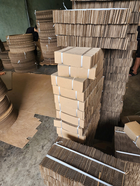 Tấm lót carton - Thùng Carton Hoàng Nam Như - Công Ty TNHH Sản Xuất Thương Mại Hoàng Nam Như