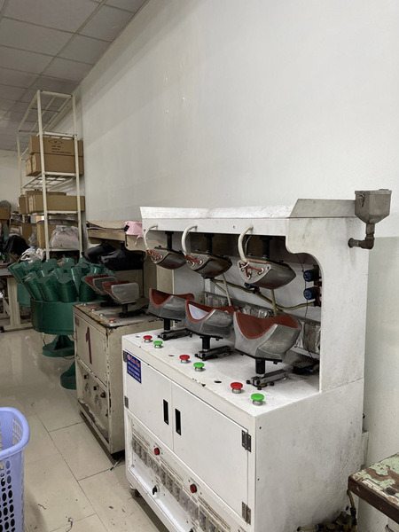 Ủi hơi nước - Gia Công Mũ Nón Bình Minh Việt - Công Ty TNHH Bình Minh Việt