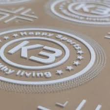 Sticker dập nổi logo - In Thẻ Bài, Nhãn Treo Hải Đăng - Công Ty TNHH Giải Pháp Hải Đăng