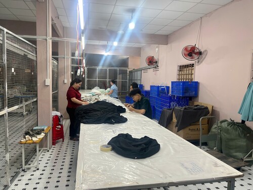 Khu vực kiểm tra đóng gói - Quần áo Xuất Khẩu Dawning - Công Ty TNHH Thương Mại Dawning