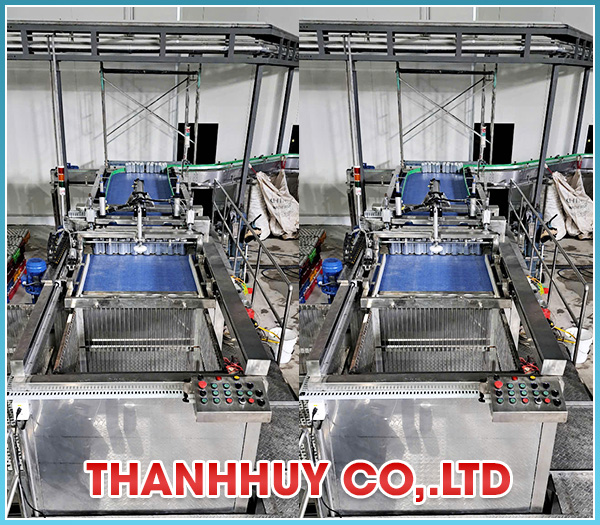 Máy xếp lon vào sọt tiệt trùng